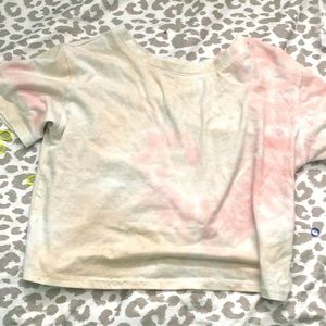This is a tidied crop top beige and pink